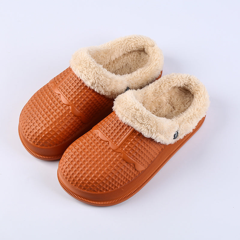 Removable deodorant cotton shoe cover in cozy orange color with soft fluffy lining for comfort and warmth.