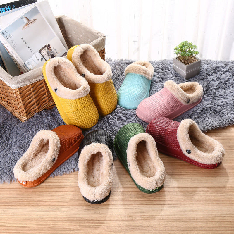 Colorful collection of removable deodorant cotton shoe covers displayed on a soft rug.