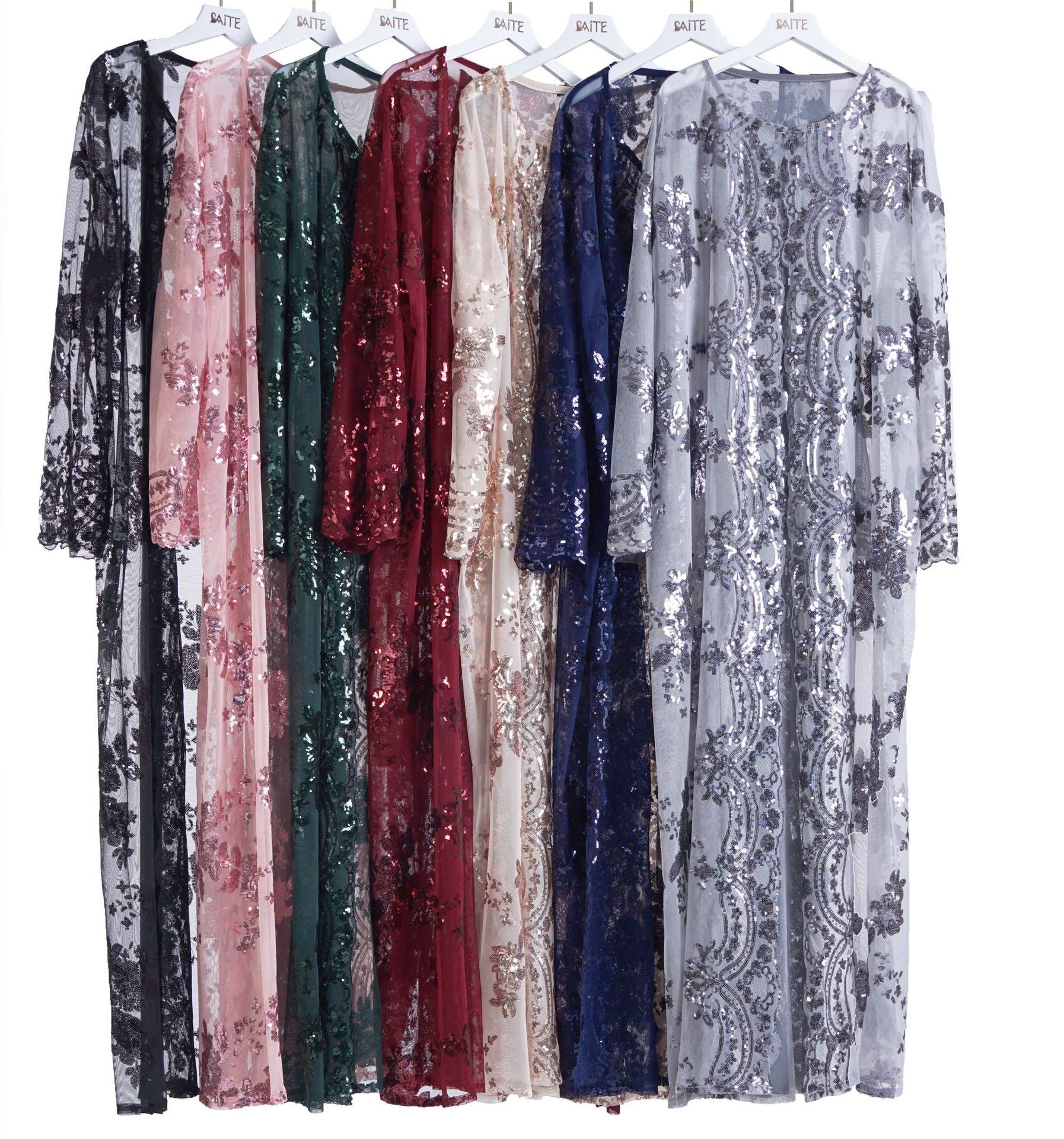 Women Short Sleeve Printed Flower Dress featuring multiple colors and decorative sequins for a stylish look.