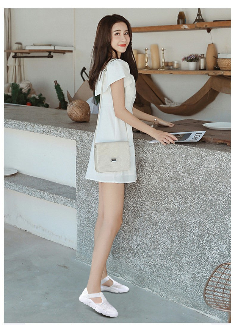 Woman wearing Casual Flat Fisherman Shoe Women with a shoulder bag in a stylish indoor setting.
