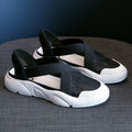Casual Flat Fisherman Shoe Women displayed on a gray surface, featuring a modern flat sole and breathable design for comfort.