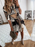Women Dresses Fashion Ladies Casual Dress in stylish print worn with chic accessories in modern interior setting.