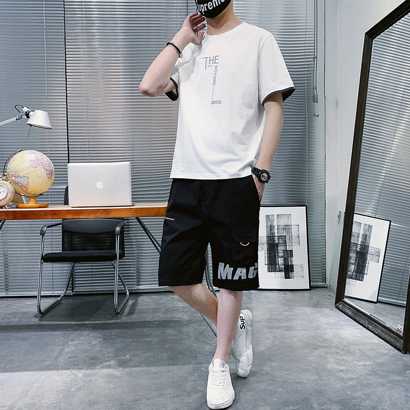 Casual Summer New Men's Hip-hop outfit featuring a stylish t-shirt and shorts in an urban setting.