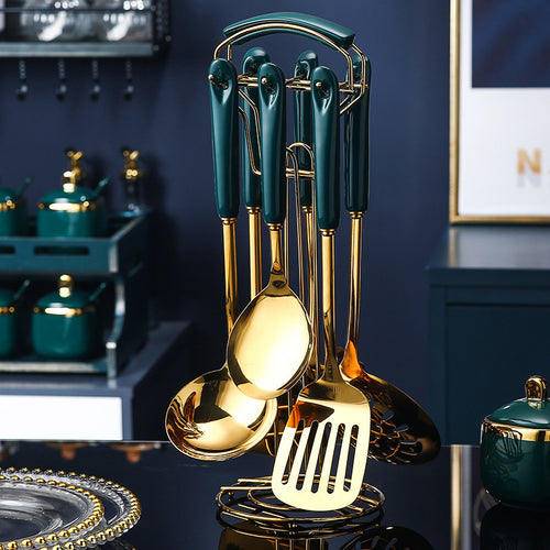 7 PCS Stainless Steel Silicone Kitchen Utensil Slotted set displayed on a holder with elegant gold and green design.