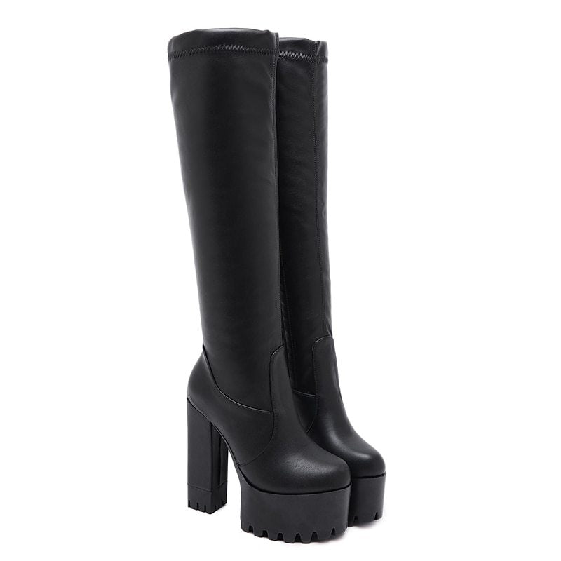 Knee-high boots for women shoe elastic boots in sleek black with platform heels.