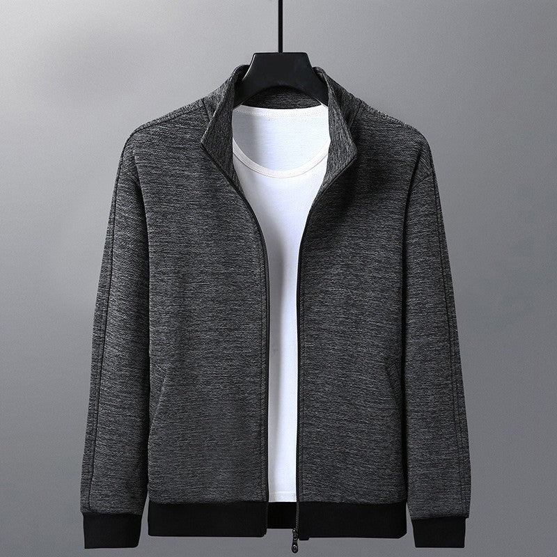 Jacket With A Stand-up Collar And A Casual Jacket in dark gray hanging on a display.