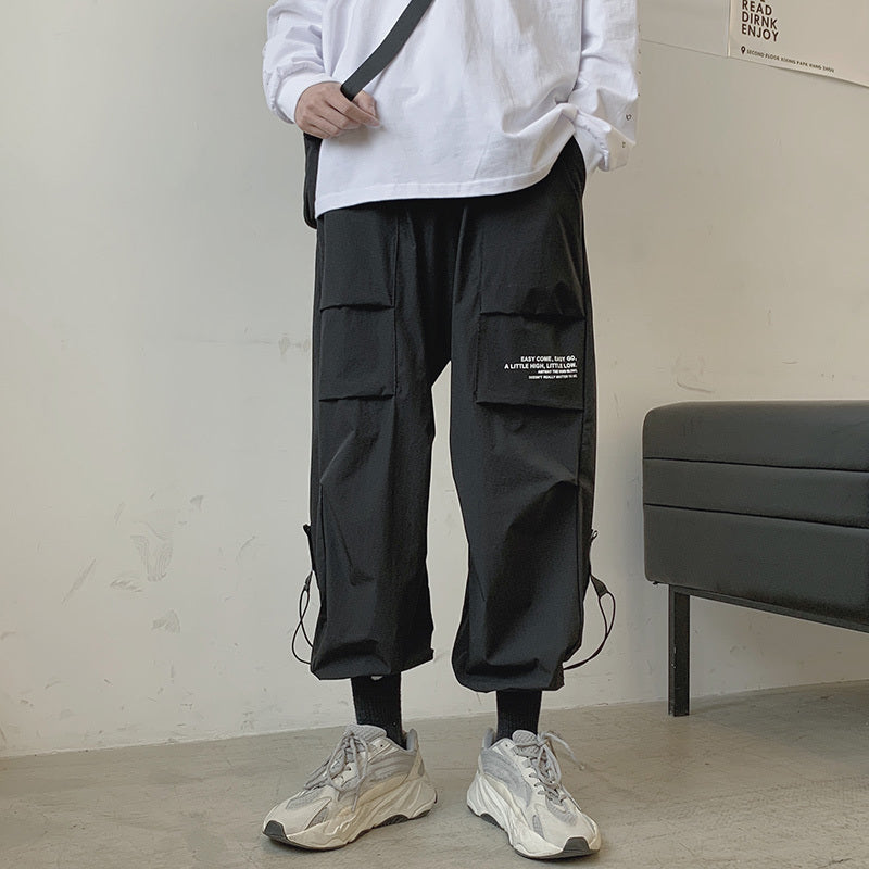 Overalls Men's Casual Plus Bulky black cargo pants with loose leg design for summer streetwear style.