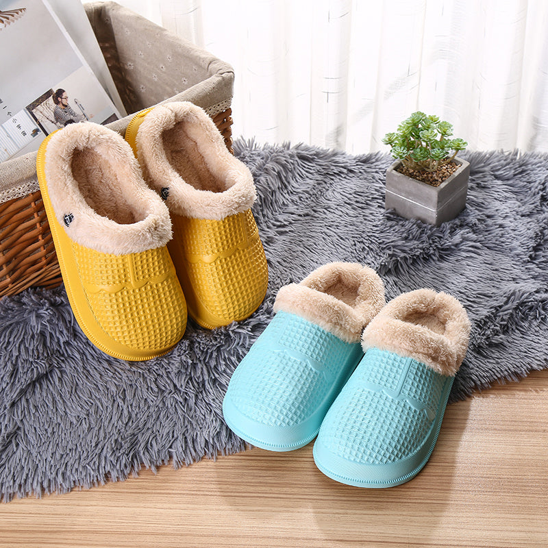 Removable deodorant cotton shoe cover in yellow and blue with cozy fur lining, perfect for comfort and odor reduction.