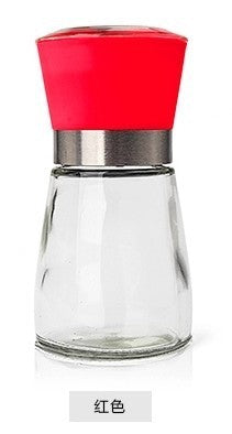 Creative kitchen appliances hand glass grinder with red lid and glass base for seasonings.