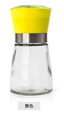 Creative kitchen appliances hand glass grinder with yellow lid for seasonings and spices.