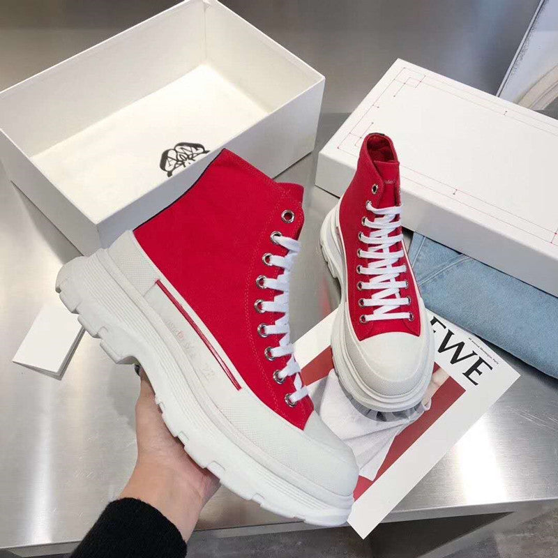 Women Shoe High Low Sole Black displayed with a red high-top sneaker design and contrasting white sole.