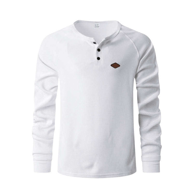 Quick-drying Raglan Henry Long Sleeve in white with button detail and brown logo.