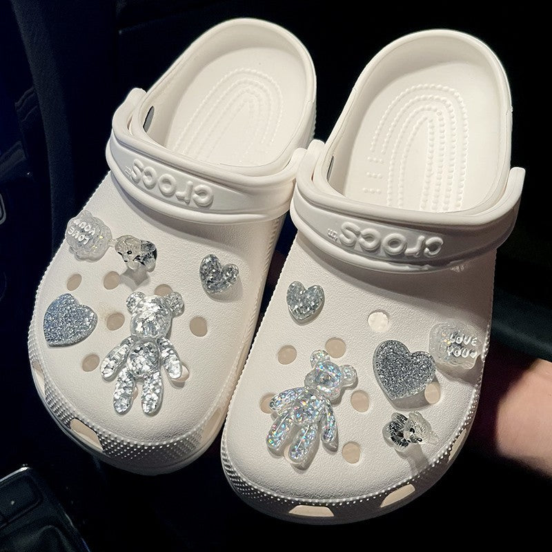 Crystal Bear Cave Shoes Accessories Shoe Buckle Shoe Flower on stylish white Crocs with glittering bear and heart details.