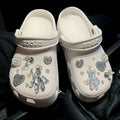 Crystal Bear Cave Shoes Accessories Shoe Buckle Shoe Flower on white Crocs with shiny embellishments.
