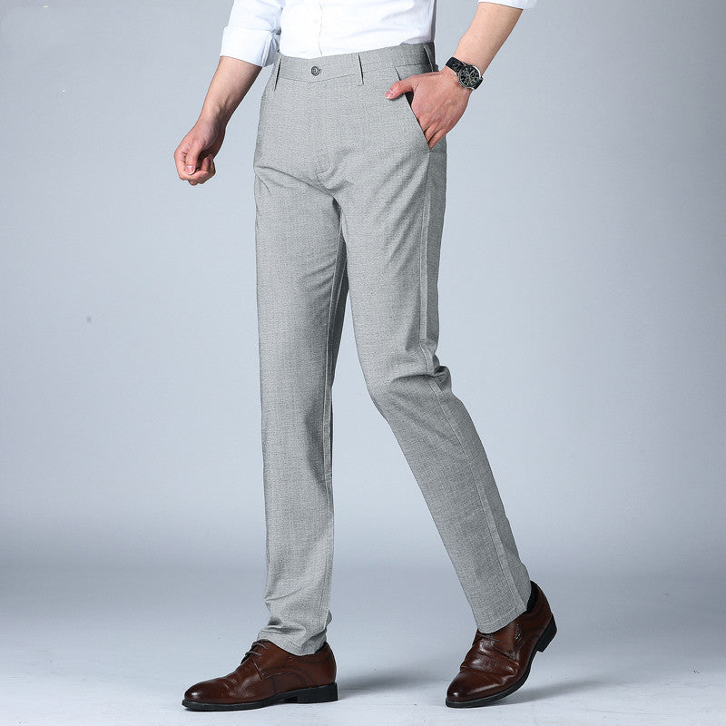 Woodpecker Thin Men's Pants Summer Non Ironing showcased on a model, featuring a stylish design and comfortable fit.