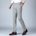 Woodpecker Thin Men's Pants Summer Non Ironing showcased on a model, featuring a stylish design and comfortable fit.