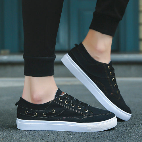 Breathable casual lazy canvas shoes in black, featuring a sleek design with white soles for everyday style and comfort.