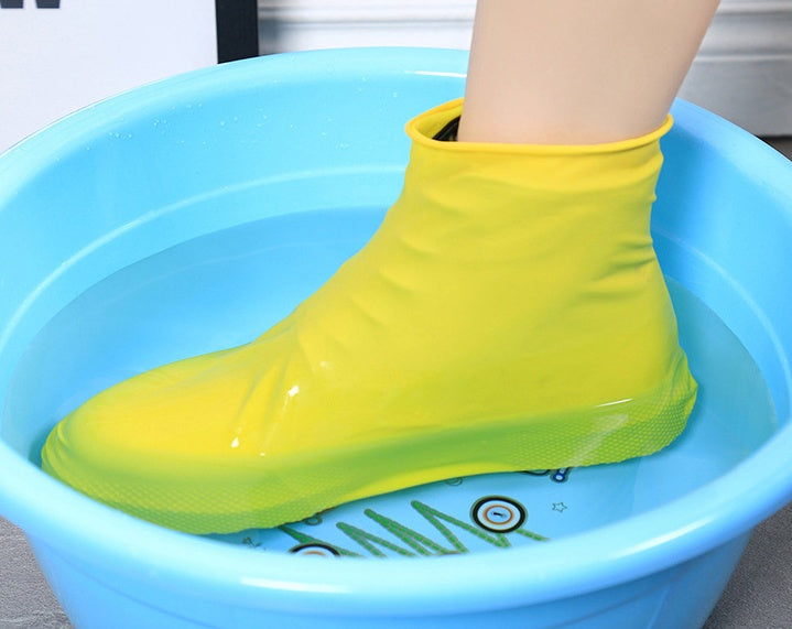 Rubber Anti-slip Waterproof Shoe Cover Reusable Rain Boot worn in water to showcase waterproof capability.
