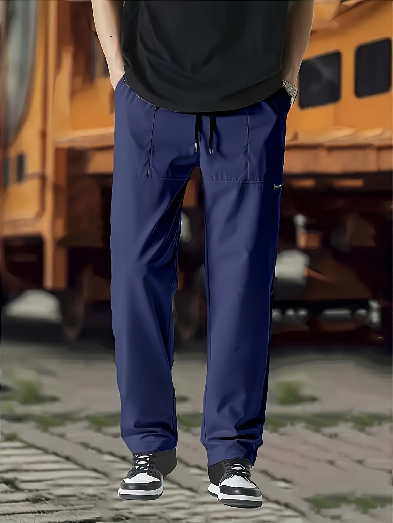 Men's Fashion Training Brother Basketball Pant worn by a man, standing in casual shoes, showcasing sport-inspired style.