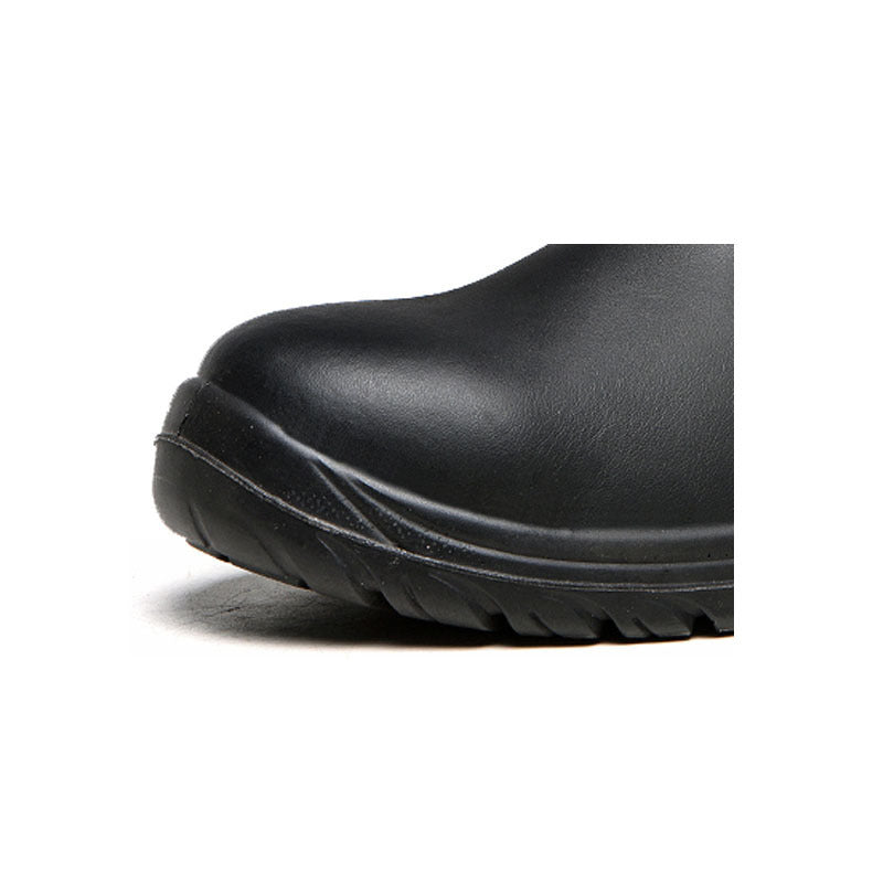 Leather safety shoes boots safety work shoes close-up showing durable sole and premium leather material.