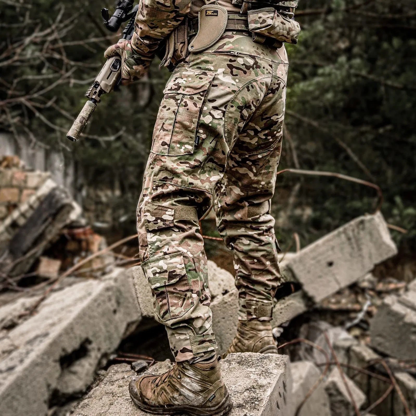 Men's Tactical Combat Tactical Military Pants worn by a soldier in a rugged environment.