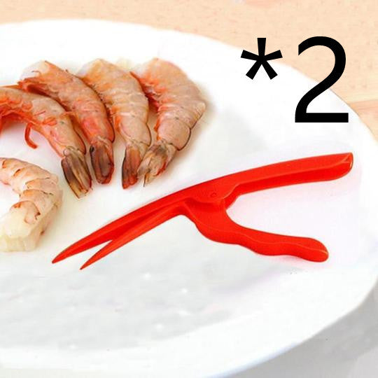 Shrimp Peeler Kitchen Appliances on a plate with shrimp, showcasing efficient seafood peeling tool.