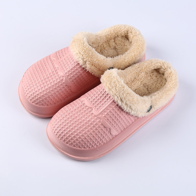 Removable deodorant cotton shoe cover in pink color with fluffy lining for added comfort and warmth.