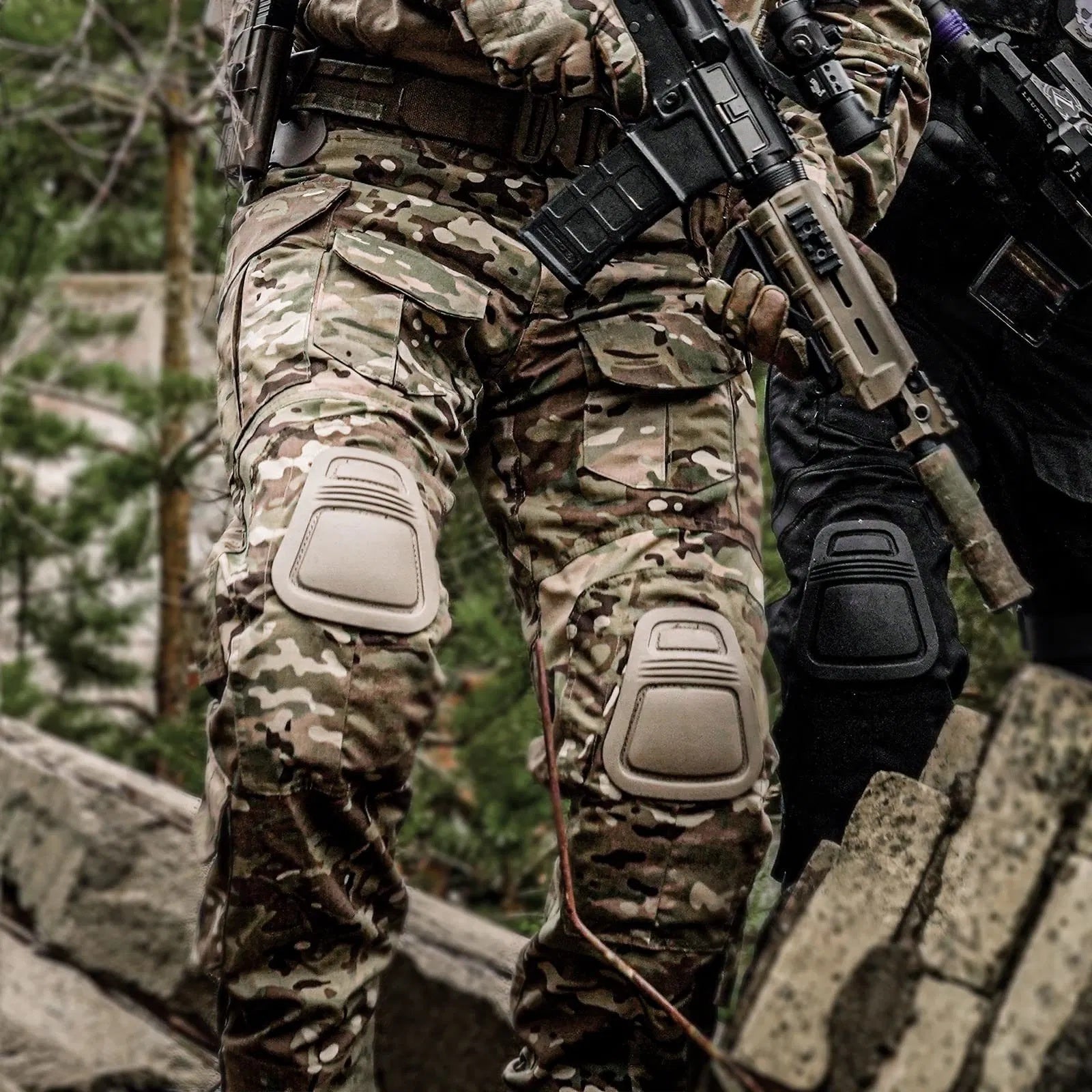 Men's Tactical Combat Tactical Military Pants worn in action with camouflage design and knee pads, suitable for rugged environments.