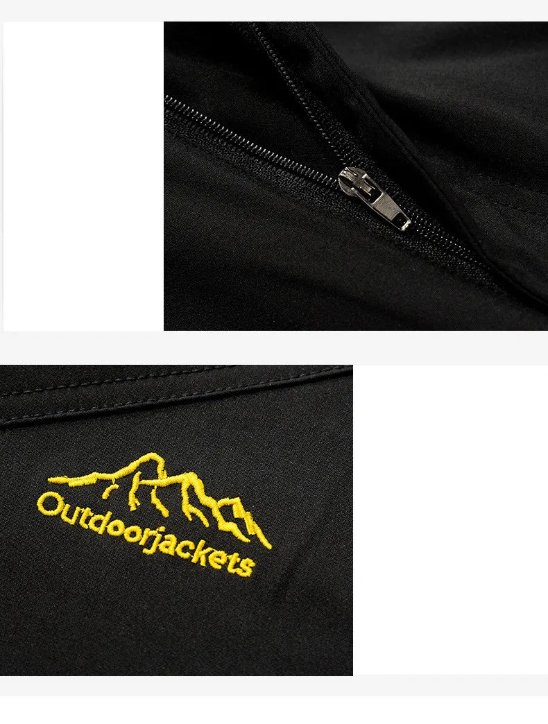 Close-up of a black outdoor jacket featuring a zip and yellow embroidered Outdoorjackets logo.