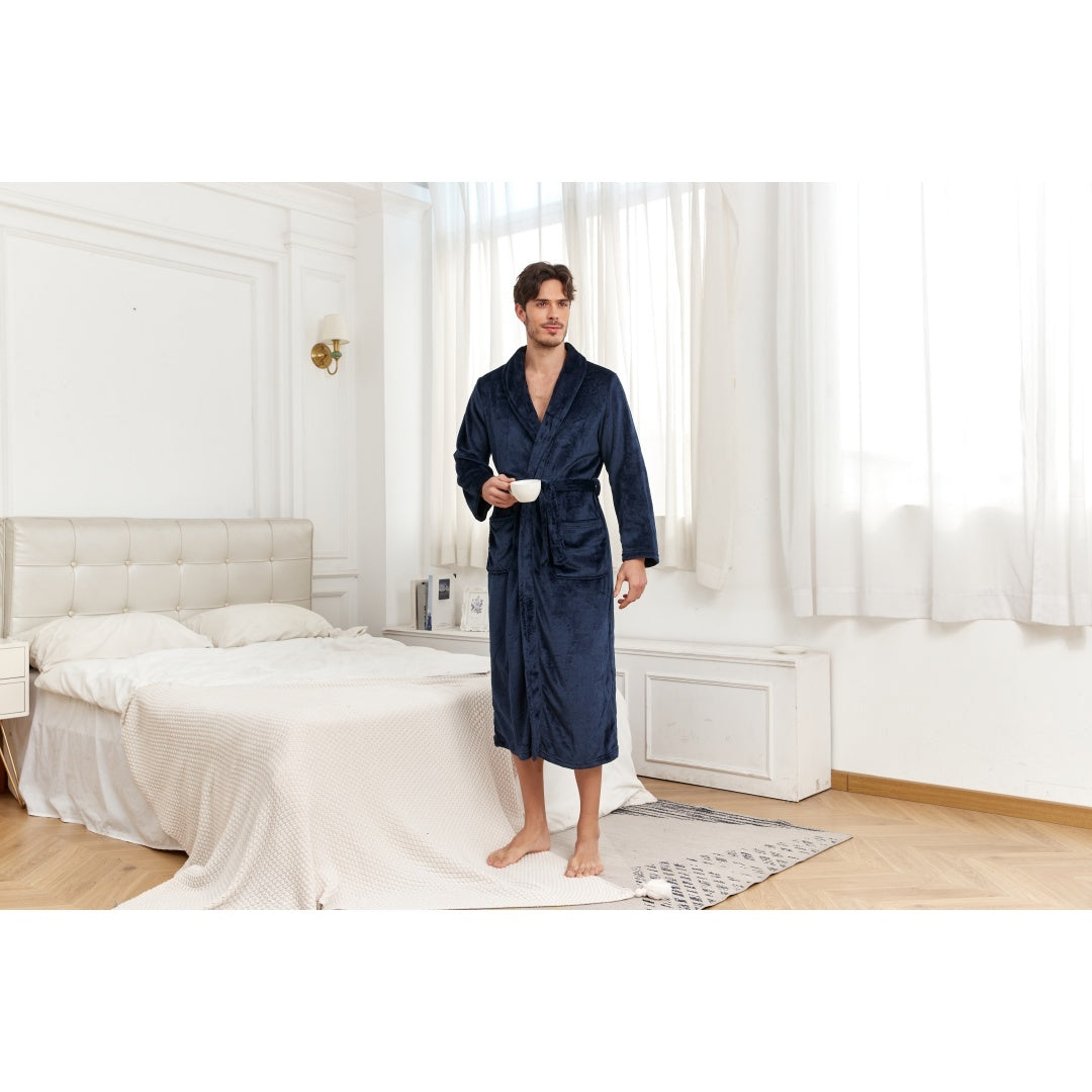 Man in Men's Plush Long Robe Soft And Warm Bathrobe standing in a bright bedroom holding a cup.