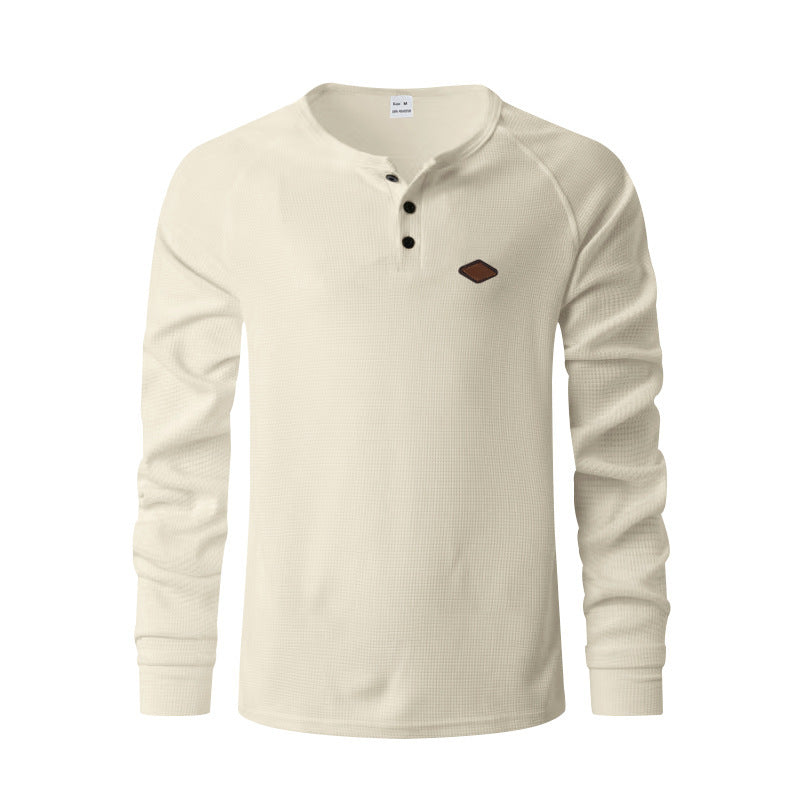 Quick-drying Raglan Henry Long Sleeve in cream color featuring a classic Henley design and button detail.