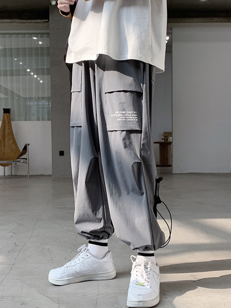 Overalls Men's Casual Plus Bulky worn by a model in a modern urban setting showcasing wide leg design.