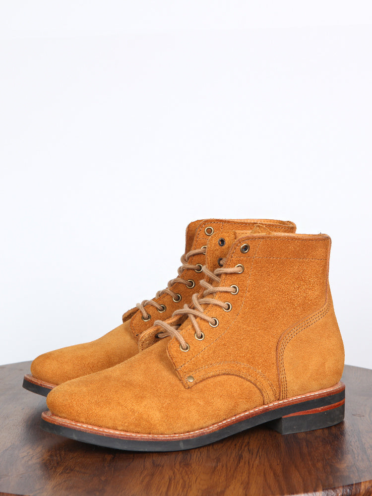 Vintage Work Boots High Top in a rich tan color, featuring a classic high-top design and durable suede material.